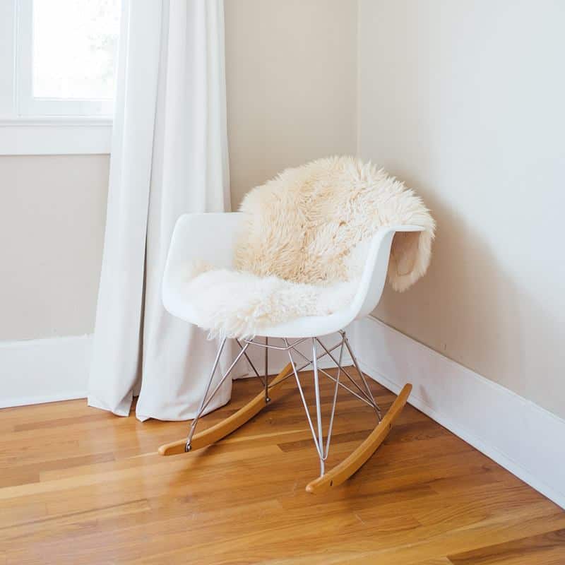 rocking chair inside the room | byBespoek