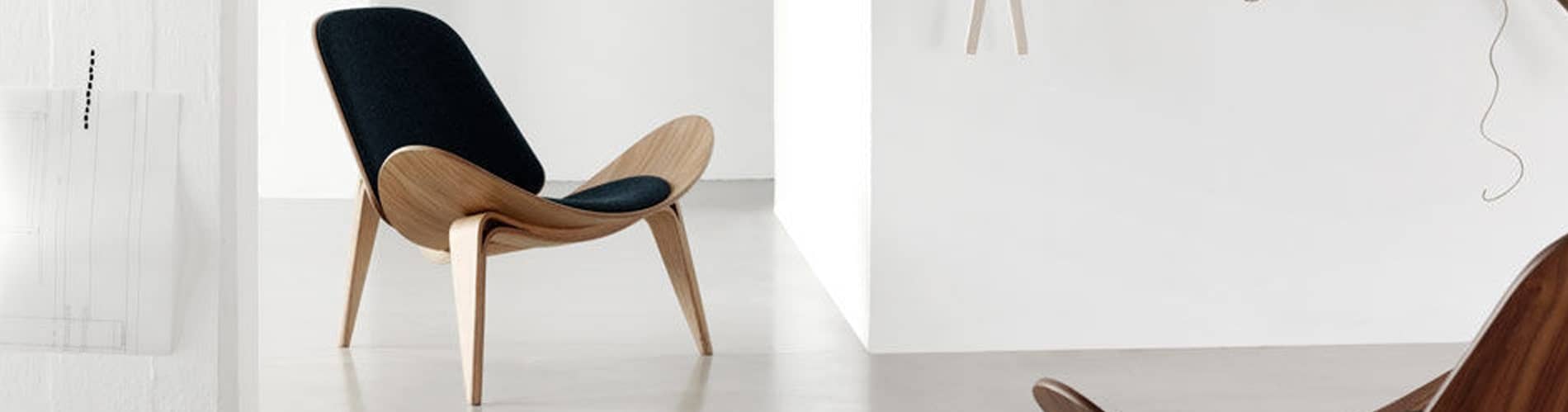 Hans Wegner shell chair (CH07) inside a room | byBespoek